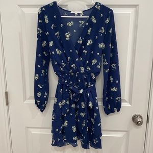 Navy blue dress with floral pattern. Detachable matching belt. Size large.